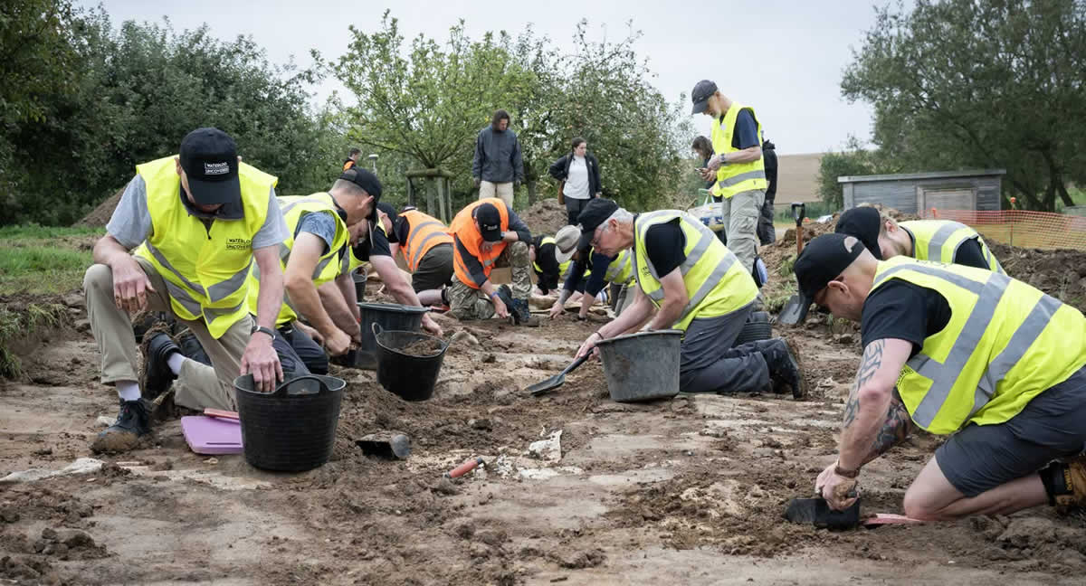 US, Dutch and British veterans excavating US, Dutch and British veterans excavating